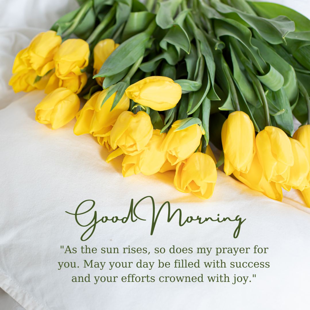 A bouquet of fresh yellow tulips on a white cloth with a "good morning prayer" message and a heartfelt wish for success and joy.