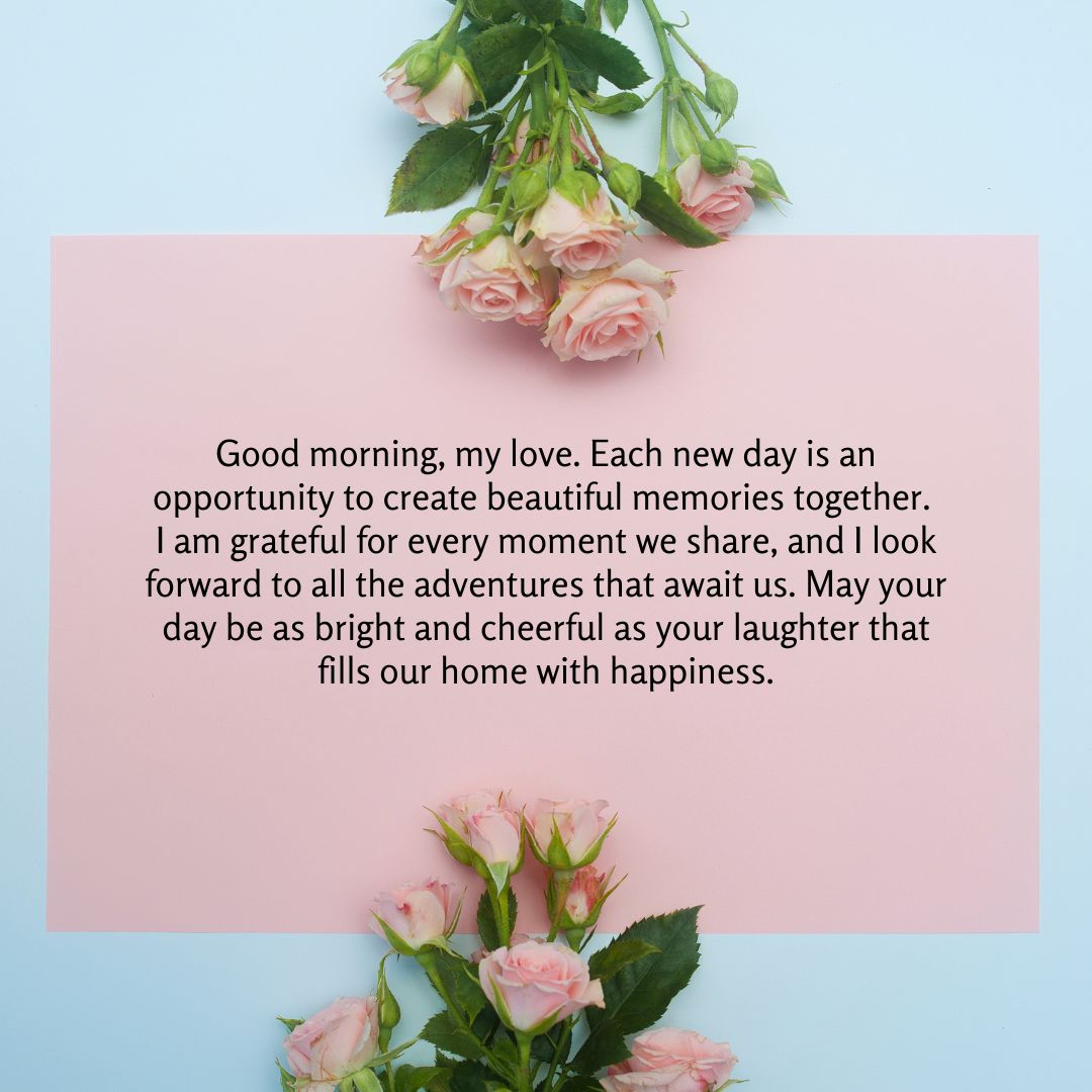 A note with a heartfelt "Good Morning Love" message surrounded by fresh roses on a two-tone background (blue and pink).