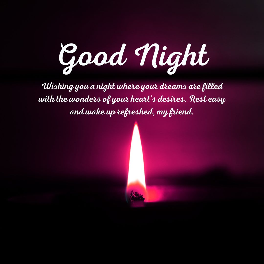 A glowing candle with a bright flame against a dark, purple background displaying the words "spiritual good night" and a message wishing the viewer dreams filled with their heart's desires.