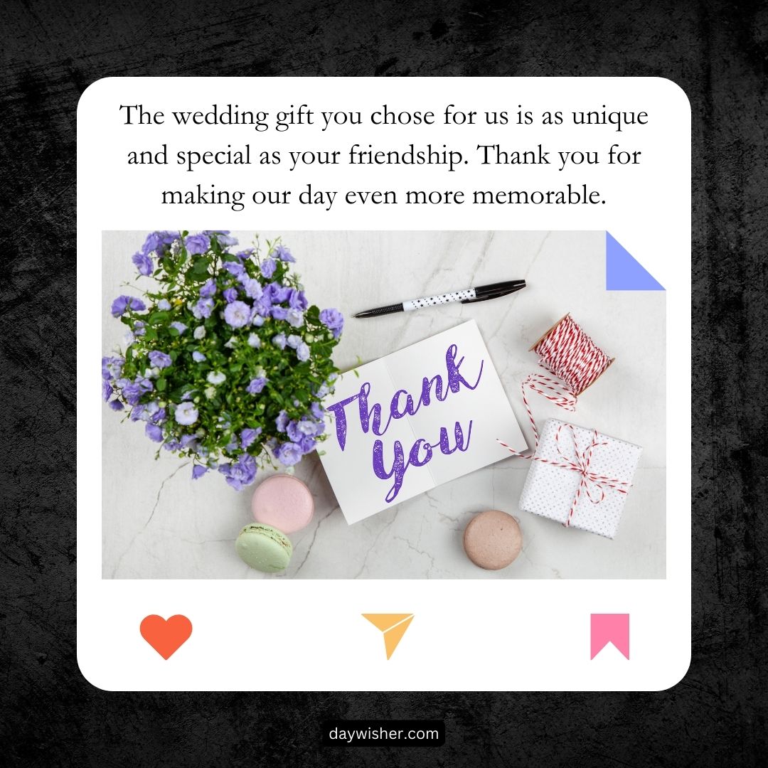 A marble surface displays a "Thank You for Wedding Gift" card, pen, twine, macarons, and a small bouquet of purple flowers, symbolizing gratitude for a unique wedding gift.