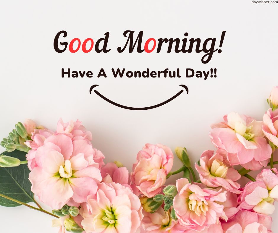 A cheerful "good morning images! have a wonderful day!!" greeting card with pink flowers on the bottom left corner against a white background, accompanied by a smiley face.