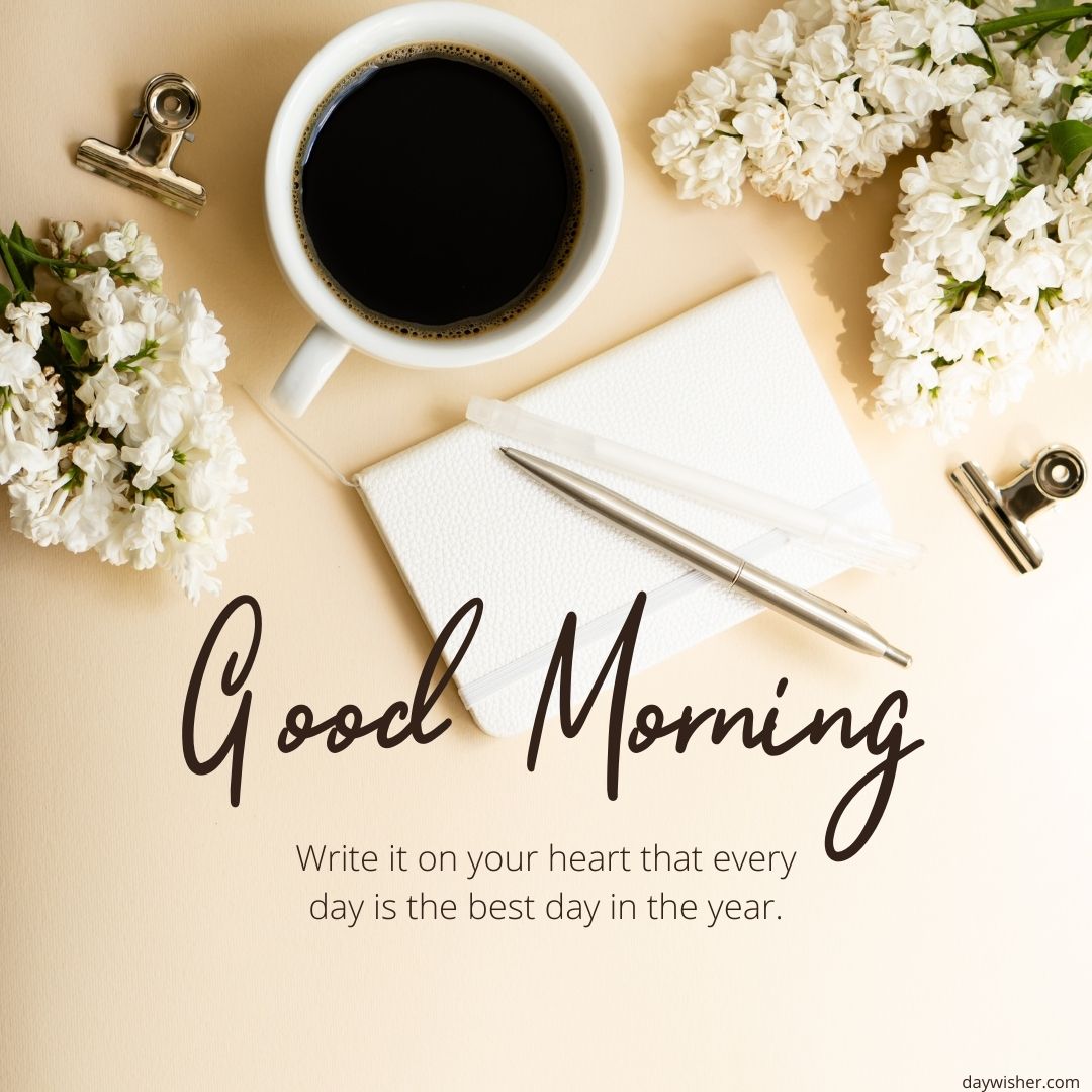 A styled desktop with a message "good morning" over a light background, featuring good morning images, a cup of coffee, white flowers, a notepad, and a pen.