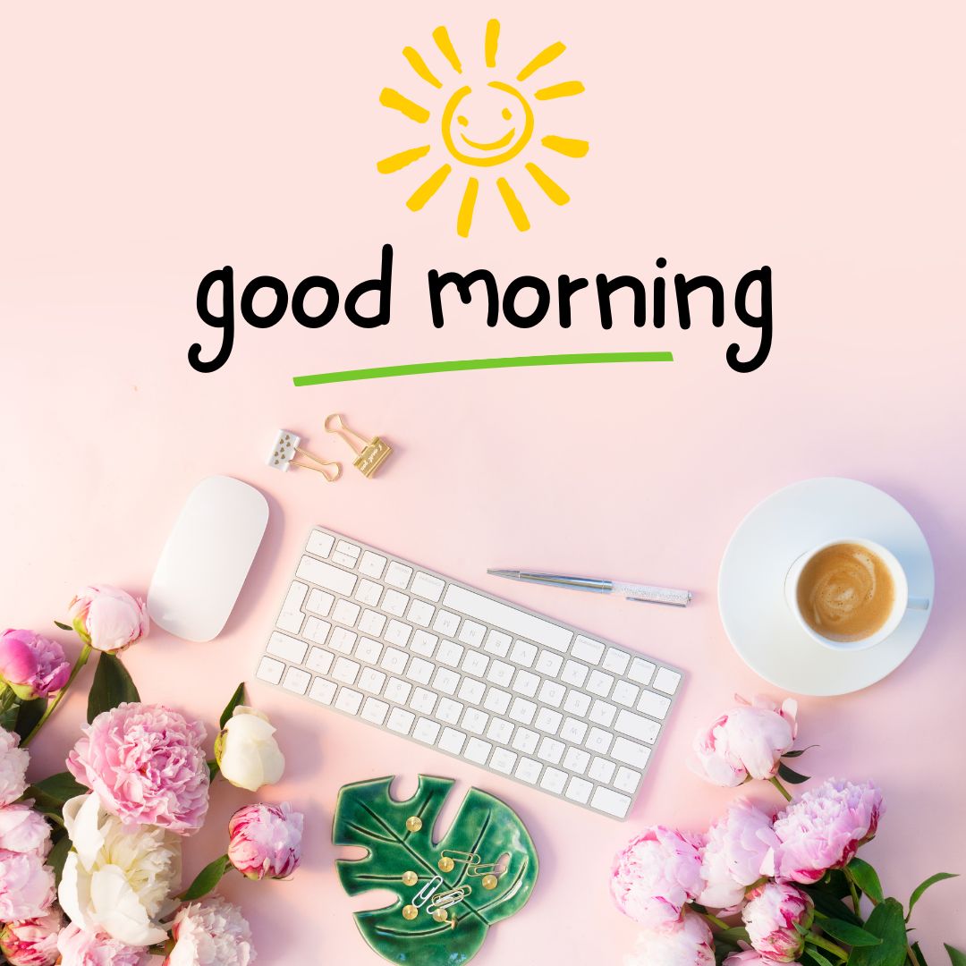 Flat lay of a pink workspace with a keyboard, mouse, cup of coffee, various stationery items, and peonies, featuring a doodle sun and "good morning images" text.