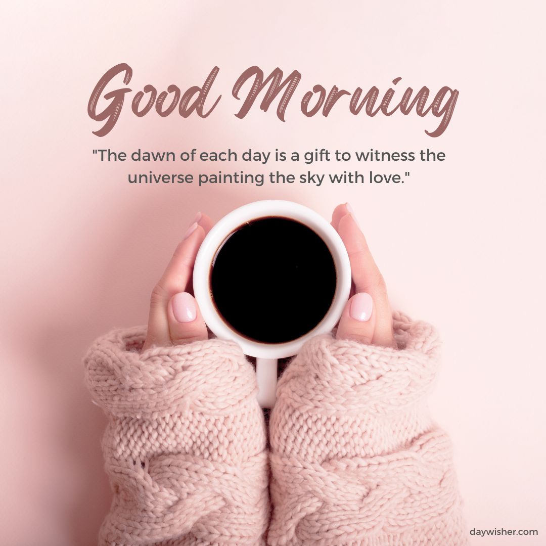 Hands holding a white cup of coffee, wrapped in a pink knitted sweater, over a pink background with the text "Good Morning Images with Quotes" and an inspirational quote about the dawn.