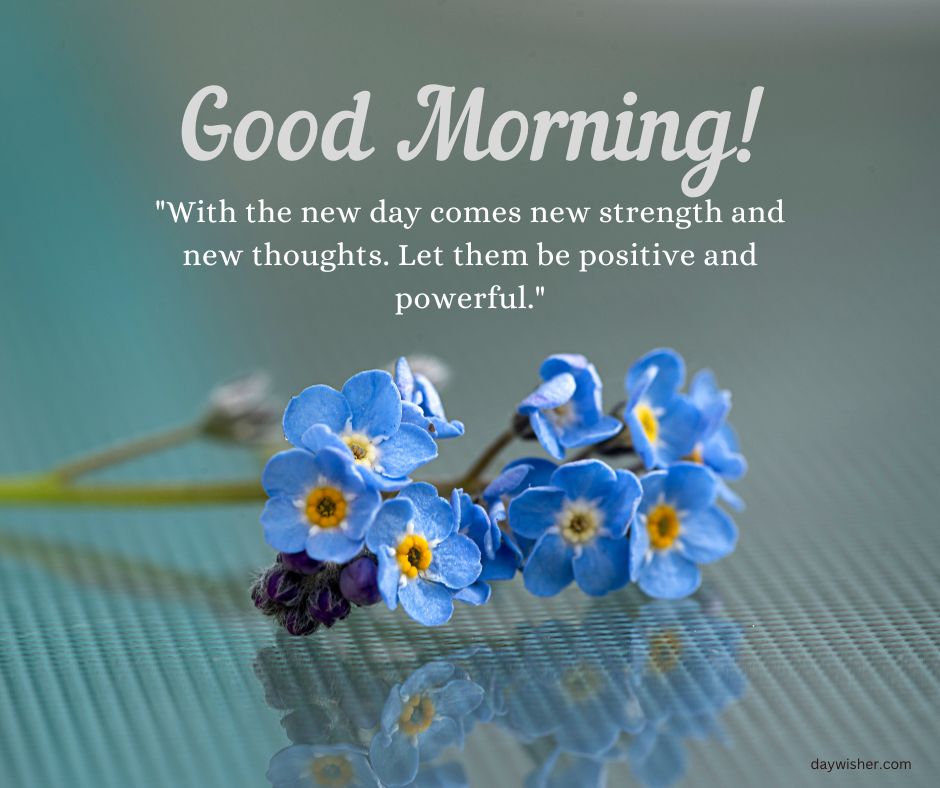 A serene image featuring a "Good Morning Images with Quotes" message, with a quote about new strength and thoughts beside vibrant blue forget-me-not flowers on a soft blue background.
