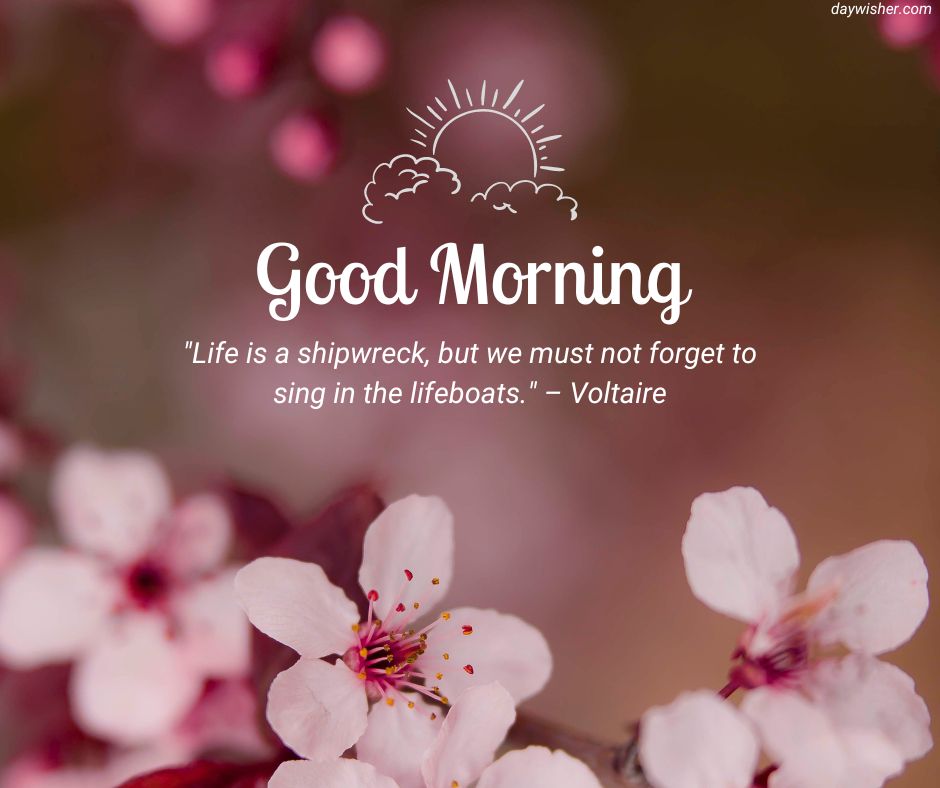 An inspirational "Good Morning Images with Quotes" image featuring a quote by Voltaire over a background of soft focus cherry blossoms, with a small drawing of a sun and clouds at the top.