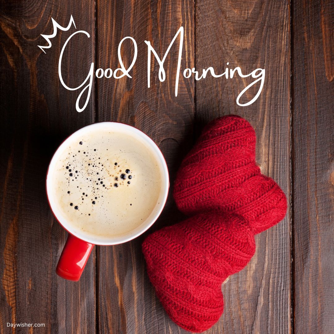 Top view of a red mug filled with coffee next to cozy knitted red mittens on a wooden surface, with "Good Morning Love" written in cursive above.