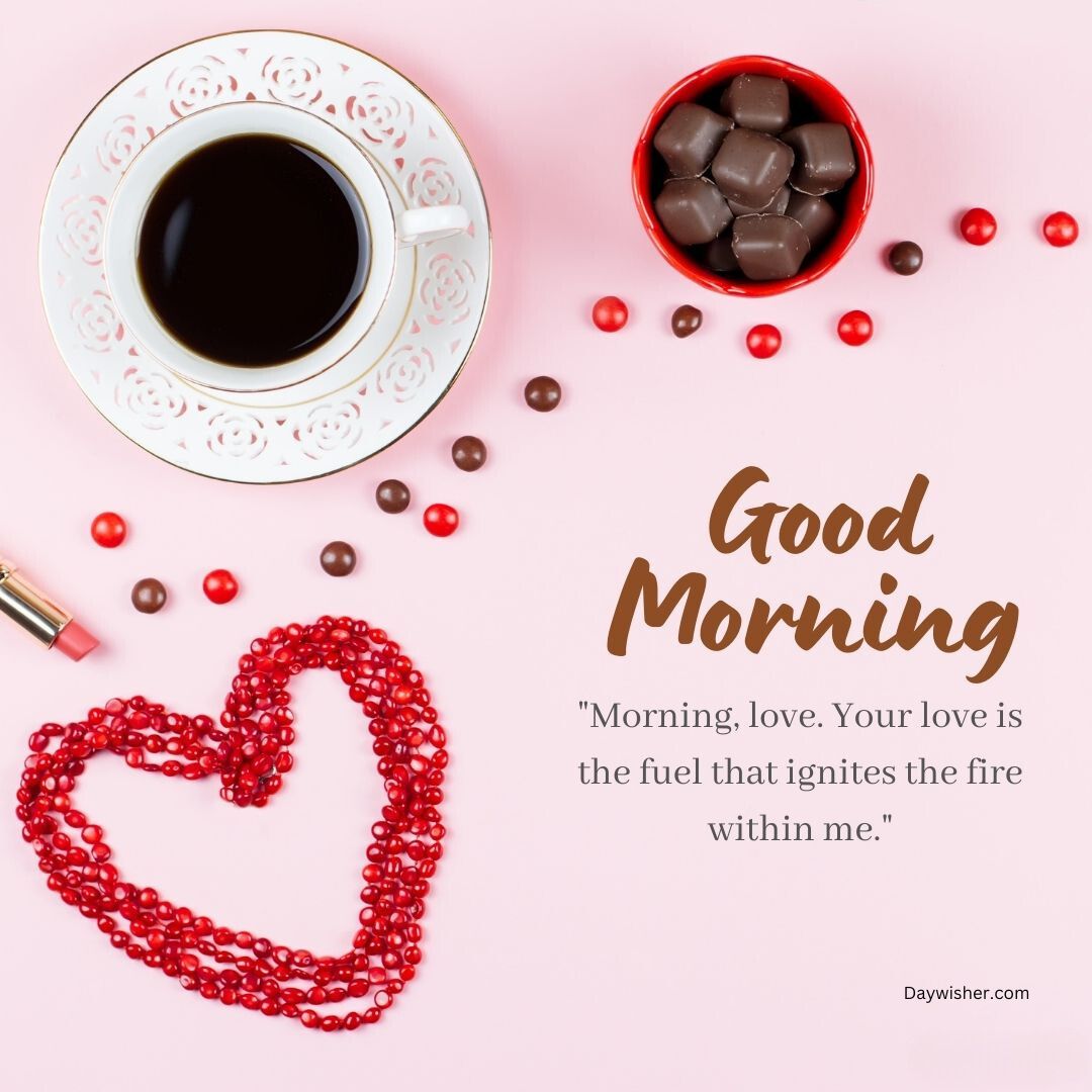A flat lay featuring a cup of coffee, a container of chocolates, and decorative red beads forming a heart with the text "Good Morning Love" and a romantic quote on a pink background.