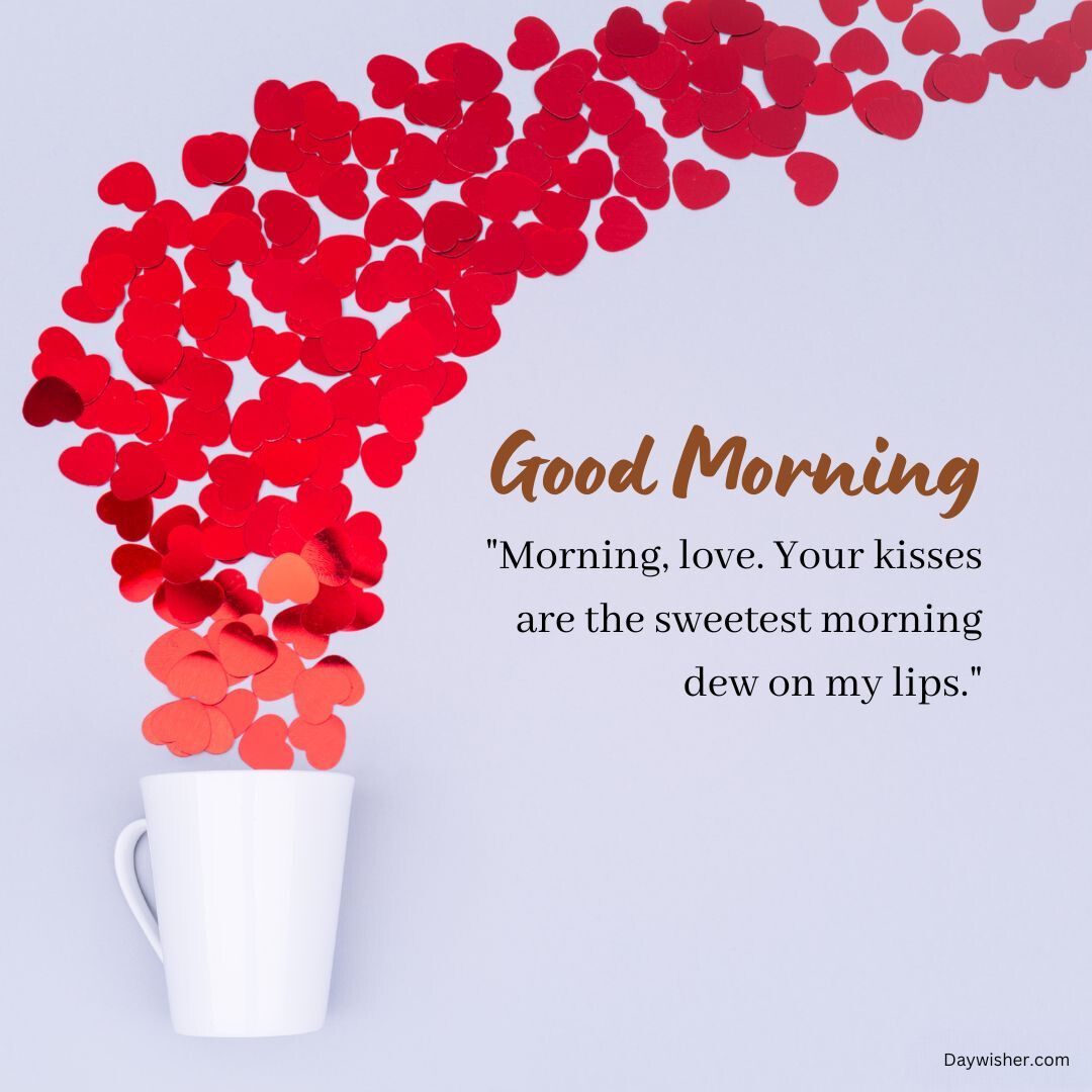 A white mug with a cascade of red paper hearts flowing into it, set against a pale background, with the text "Good Morning Love" and a romantic quote about morning kisses.