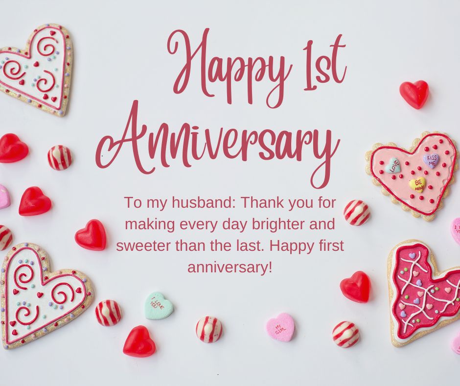 Happy 1st anniversary wishes" message with decorative heart-shaped cookies and candies on a light background, celebrating a first wedding anniversary.