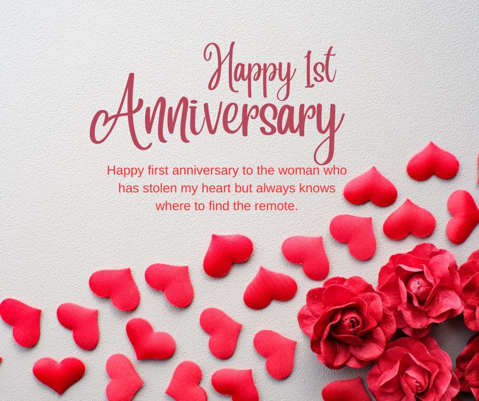 Text "happy 1st anniversary wishes" in cursive red font, with a playful message, surrounded by scattered red rose petals on a textured white background.