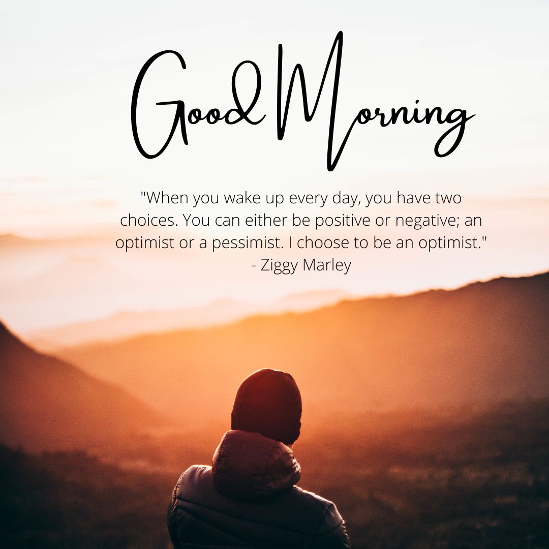 A person wearing a hat sits facing a sunrise over mountains, with "Good Morning Images with Positive Words" by Ziggy Marley printed at the top.