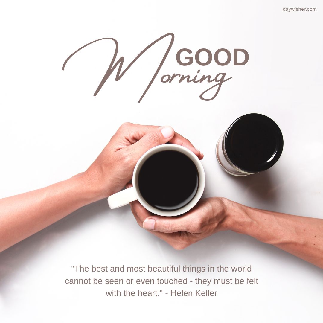 Two hands from opposite sides holding a white and a black coffee mug over a white surface with "Good Morning Images with Positive Words" and a quote by Helen Keller written.