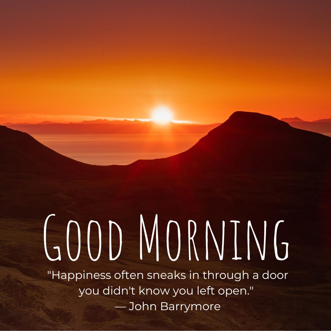 Inspirational sunrise over a mountainous landscape with "Good Morning Images with Positive Words" and a quote by John Barrymore: "Happiness often sneaks in through a door you didn't know