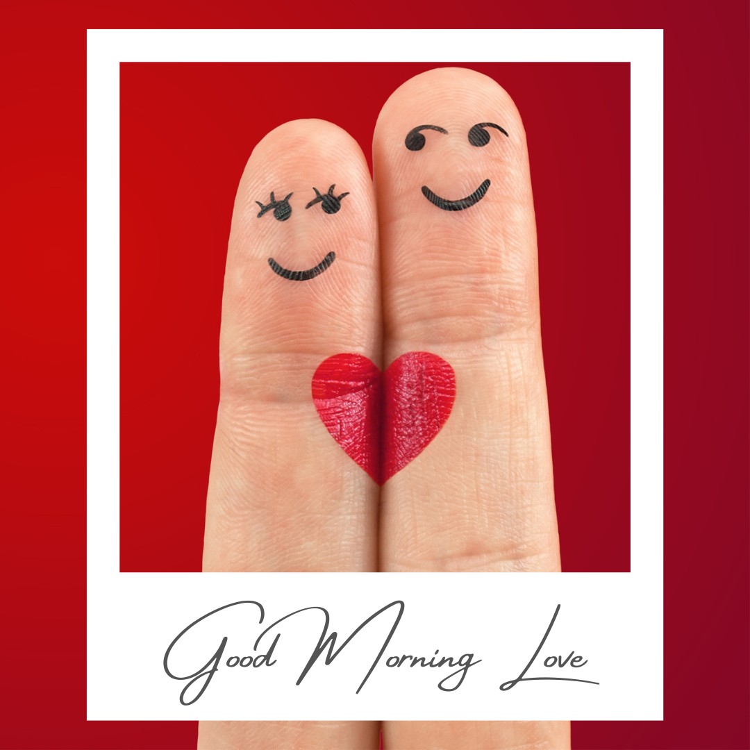 A delightful good morning heart image featuring two fingers with smiling faces drawn on them, symbolizing a couple. The fingers are joined by a red heart, set against a red background with a white border. Below the image, the text reads "Good Morning Love," making it a perfect and charming greeting to share with a loved one to start the day with love and happiness.