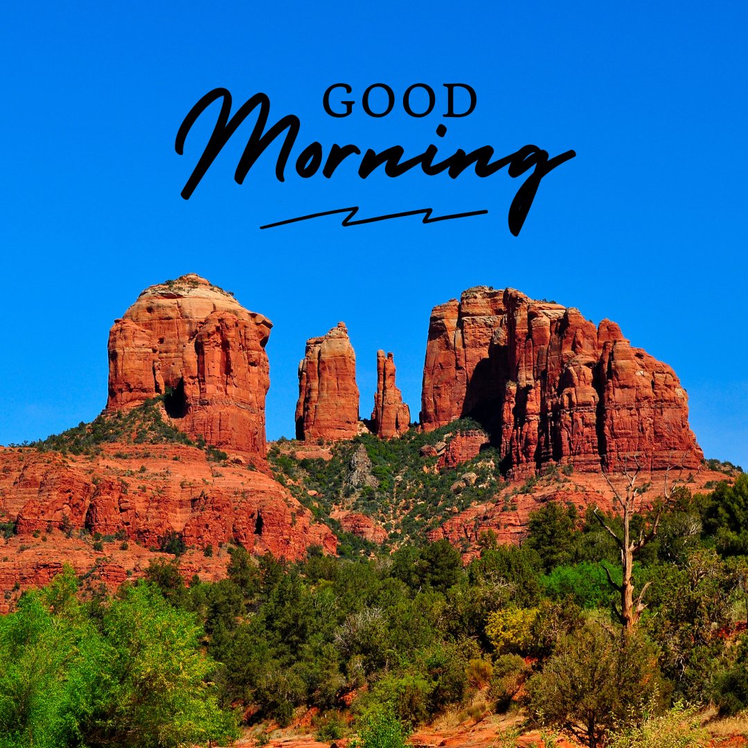 A striking landscape featuring red rock formations under a clear blue sky, with the text "Good Morning." The vibrant colors and natural beauty make for a powerful and inspiring start to the day. Ideal for good morning nature images, HD quality, and beautiful landscapes to uplift and motivate.