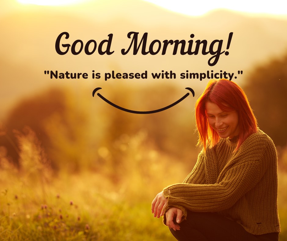 A young woman with red hair and a warm sweater smiles while sitting in a sunlit meadow. The image features the text "Good Morning! Nature is pleased with simplicity." The scene captures the calm and beauty of a simple moment in nature, ideal for good morning nature images, beautiful good morning nature images, and good morning nature images with quotes.