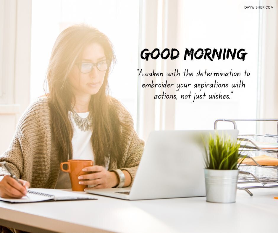 Young woman in glasses at a desk with a laptop and a cup of coffee, reading motivational Good Morning Images with Positive Words. Bright office setting with natural light and a small potted plant.