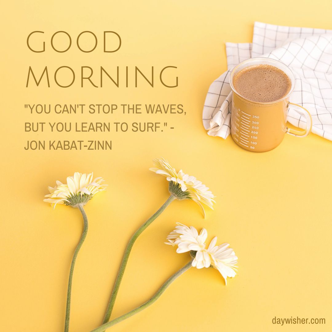 A cheerful good morning setup with a quote on a yellow background featuring three daisies, a coffee cup, and a napkin, with the text "Good Morning - 'You can't stop the